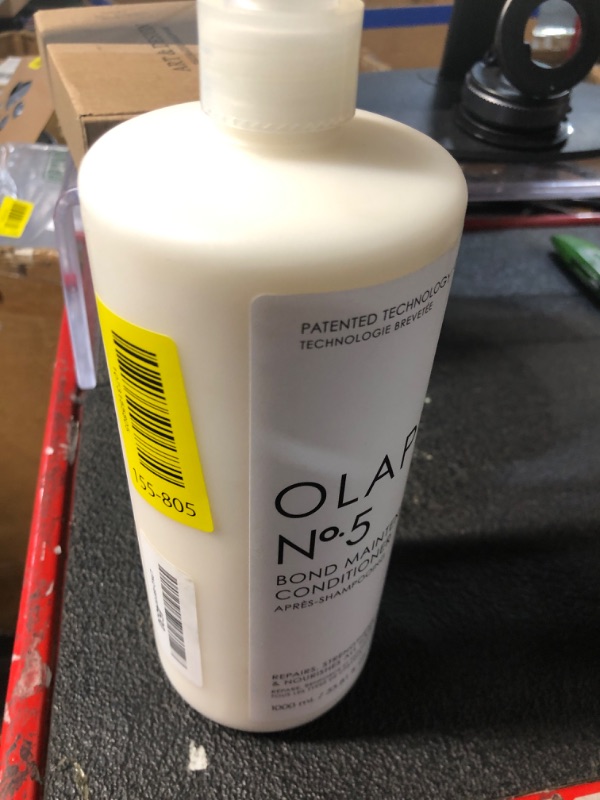 Photo 1 of ***DAMAGED - SEE NOTES/PICTURES*** Olaplex Nº.5 Bond Maintenance™ Hair Strengthening Conditioner: Repairs Damage & Defend Against Future Breakage | Reduce Frizz | For Coily, Curly, Straight, and Wavy, 1000 mL / 33.81 Fl. Oz.