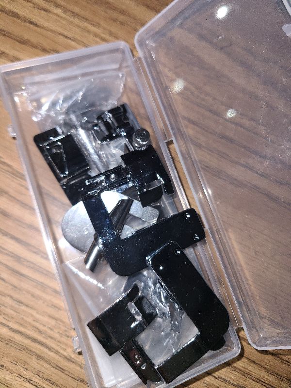 Photo 1 of 12 Pcs Hemming Foot Kit Narrow Rolled Hem Foot Set Presser Foot Sewing Rolled Hemmer Foot Narrow Sewing Machine Rolled Hem Guide Universal Sewing Clips for Sewing Machine Accessories and Tools