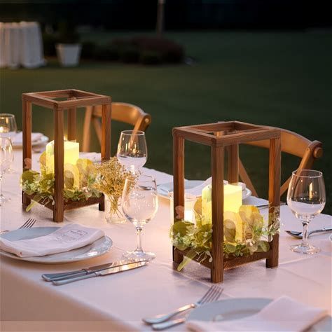 Photo 1 of Wooden Wedding Lantern Centerpiece with Candle Holder and Eucalyptus Wreath
4.6
