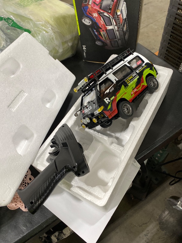 Photo 1 of Delica RC Car,1/24 Scale Station Wagon ,2.4Ghz Remote Control Truck ,4WD RC Crawler?Equipped with Cool LED Lights?Off Road Vehicle Model Suitable For Adults (4WD-Black)