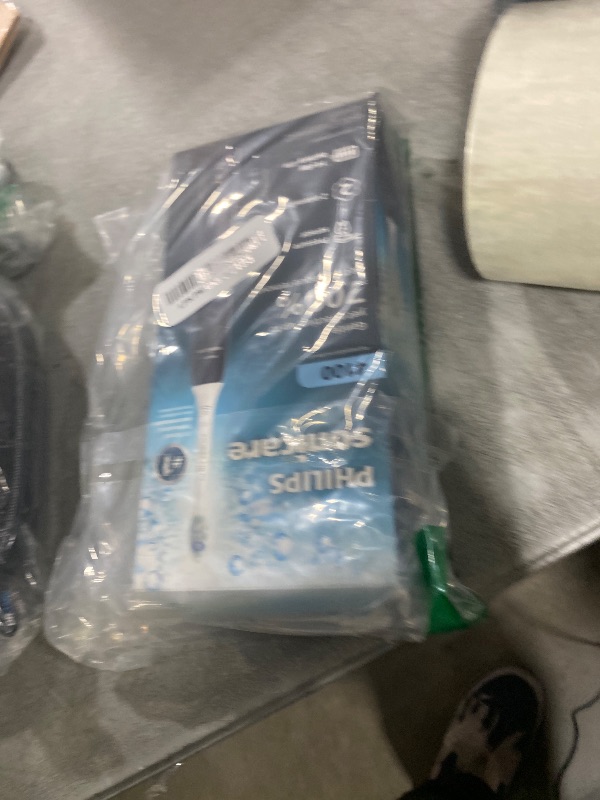 Photo 1 of Philips Sonicare 4100 Series Electric Toothbrush - Sonic Toothbrush with Advanced Sonic Technology, Pressure Sensor, Two Intensity Settings, Smartimer & Quadpacer, Black, Model HX3681/24