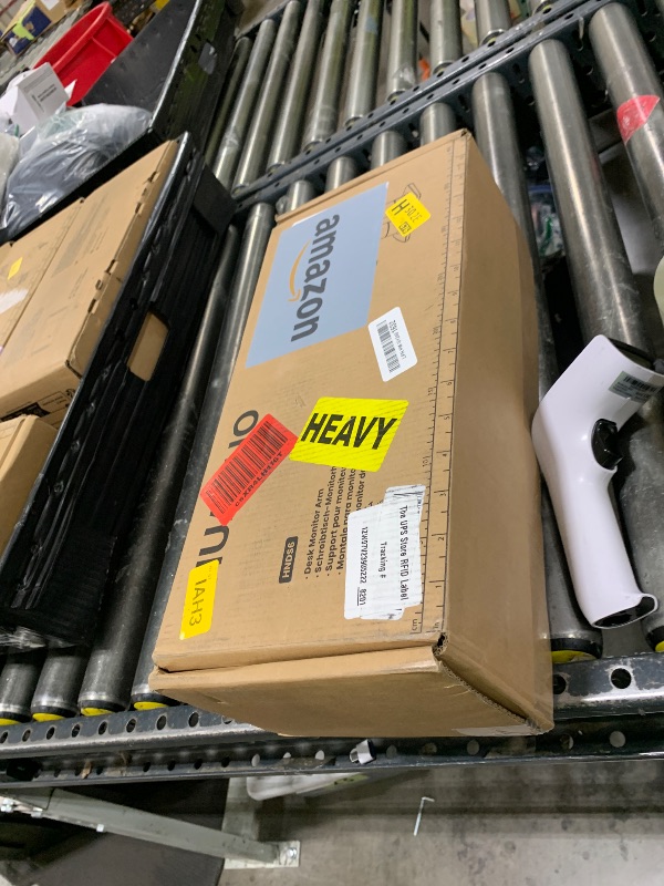 Photo 1 of HUANUO Dual Monitor Stand - Full Adjustable Monitor Desk Mount Swivel Vesa Bracket with C Clamp, Grommet Mounting Base for 13 to 32 Inch Computer Screens - Each Arm Holds 4.4 to 19.8lbs - White