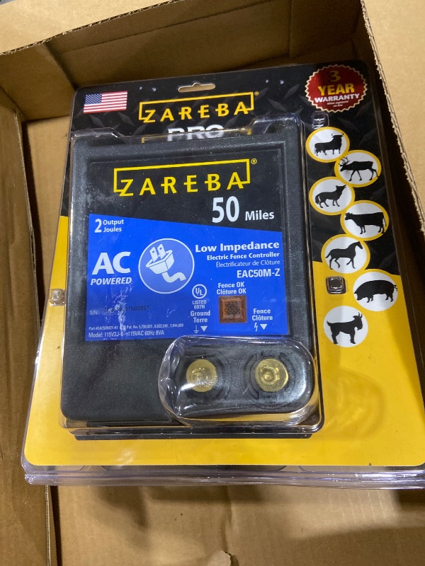 Photo 1 of Zareba 50 Mile AC-Powered Low Impendence Electric Fence Charger - Contain Pigs, Goats, Horses, Cattle, and More - Keep Out Predators - For Heavy Weed Conditions - EAC50M-Z