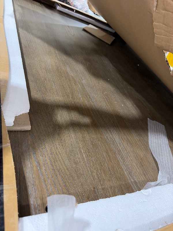 Photo 1 of Signature Design by Ashley Johnelle Farmhouse Coffee Table with Weathered Gray Finish, Gray