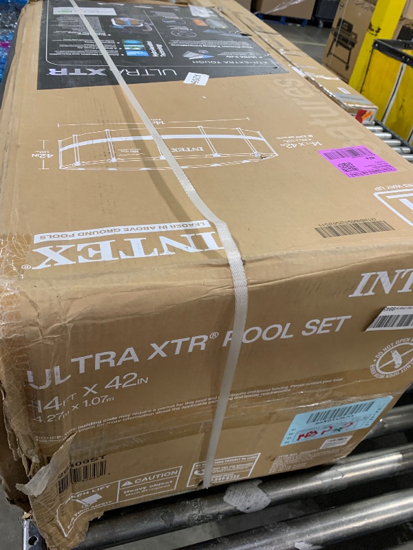 Photo 1 of Intex Ultra XTR Frame 14' x 42" Round Above Ground Outdoor Swimming Pool Set with Sand Filter Pump, Ladder, Ground Cloth, and Pool Cover