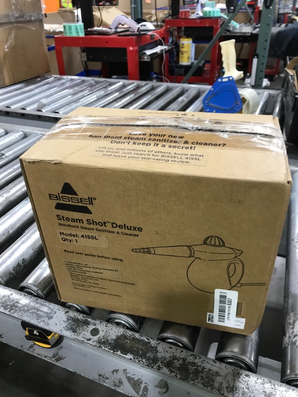 Photo 1 of BISSELL Steam Shot Deluxe handheld pressurized steamer for maintenance cleaning with 10 cleaning tools