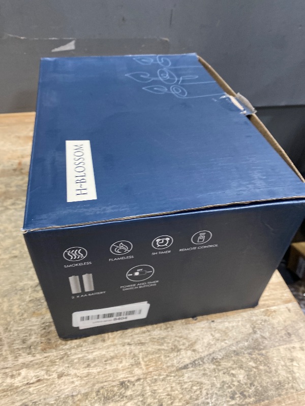 Photo 1 of **Slightly Melted**H-BLOSSOM Flickering Flameless Candles Battery Operated Real Wax Pillar Candles LED Candles with 10 Key Remote Control Cycling Timer Set of 6 (3" x 5" Remote)
