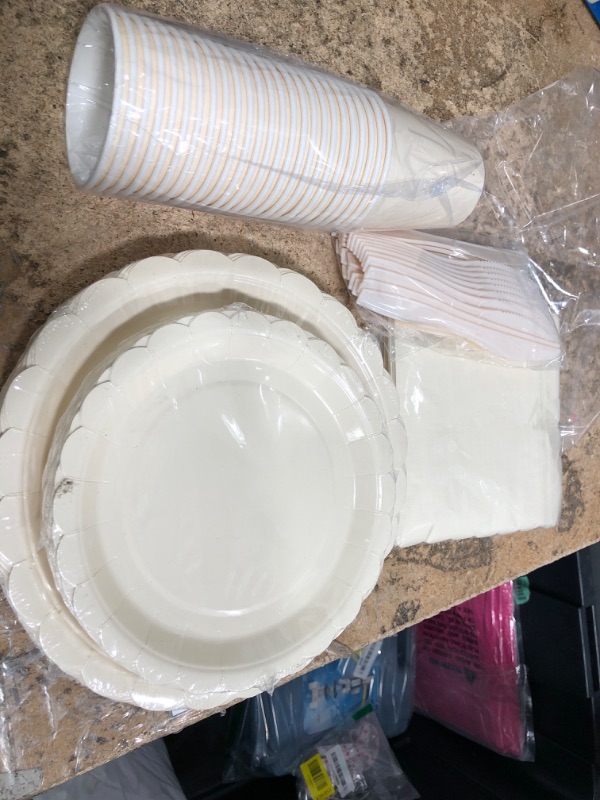 Photo 1 of plates, small cups, and napkins