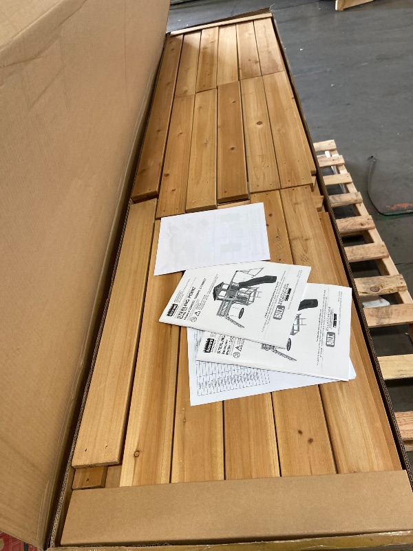 Photo 1 of **HAS SOME DAMAGED PIECES***
***pallet 3 boxes --1 slide***Backyard Discovery Sterling Point Cedar Wood Swing Set with Wave Slide, Raised Clubhouse, Wooden Bridge, Rock Wall, Belt Swings, Web Swing, Trapeze, Balcony, Climbing Wall, Ladder, Outdoor Playse