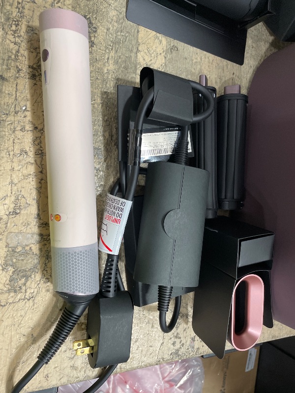 Photo 1 of ***NON FUNCTIONAL , PARTS ONLY*** Dyson Airwrap Co-anda2x Multi-Styler and Dryer Straight+Wavy in Ceramic Pink