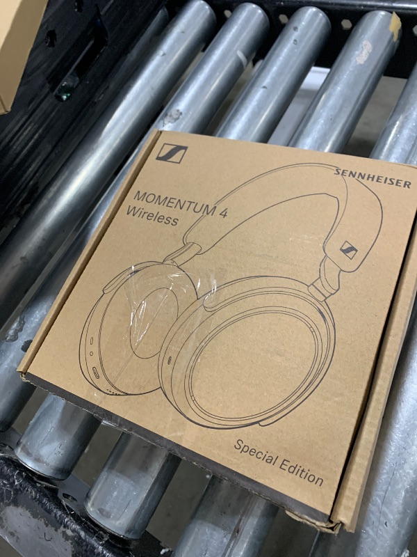 Photo 1 of Sennheiser Consumer Audio Momentum 4 Wireless Headphones - Bluetooth Headset for Crystal-Clear Calls with Adaptive Noise Cancellation, 60h Battery Life, Lightweight Folding Design - Black/Copper