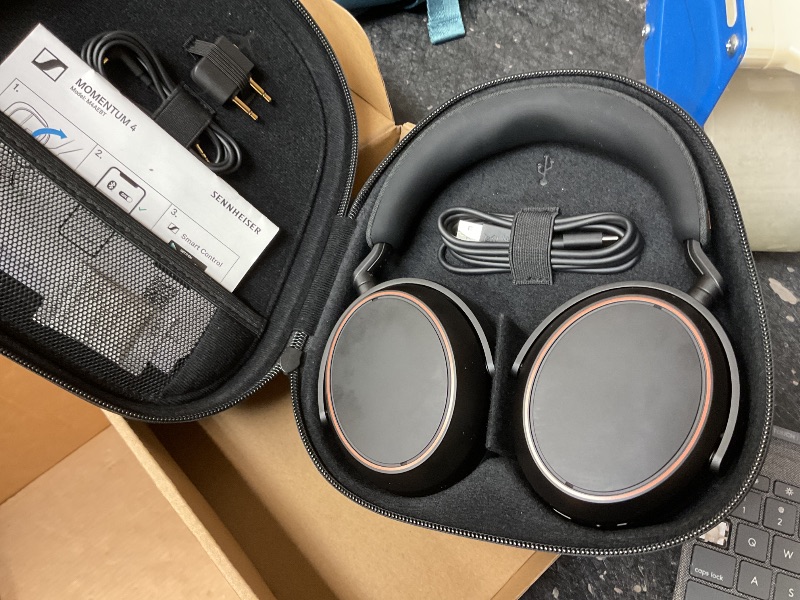 Photo 1 of **USED** Sennheiser Consumer Audio Momentum 4 Wireless Headphones - Bluetooth Headset for Crystal-Clear Calls with Adaptive Noise Cancellation, 60h Battery Life, Lightweight Folding Design - Black/Copper