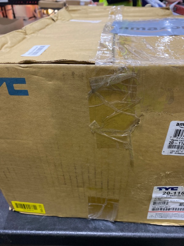 Photo 1 of TYC Right Headlight Assembly Compatible with 2007-2007 Kia Sedona