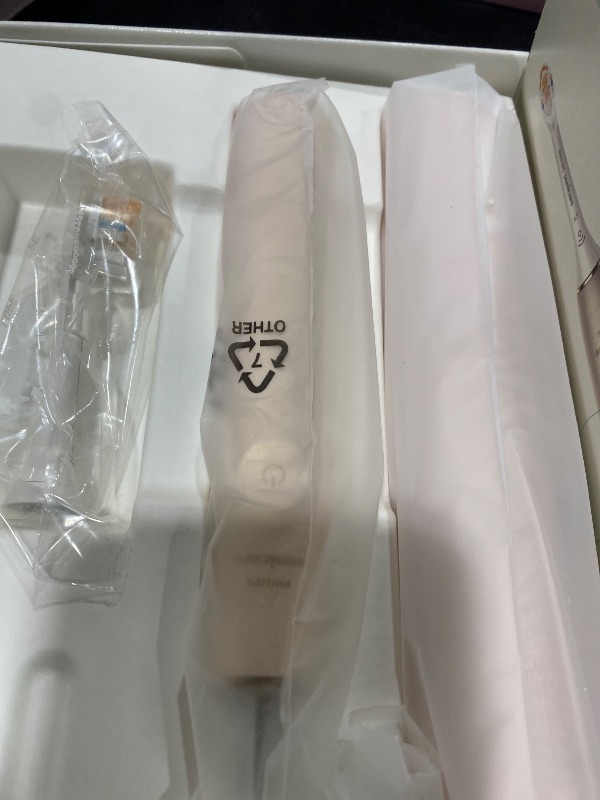 Photo 1 of Philips Sonicare DiamondClean Prestige 9900 Rechargeable Electric Toothbrush with SenseIQ, 5 Premium All-in-One Brush Heads, Plaque Removal, Gum Care, Whitening, Champagne, BD9001AZ