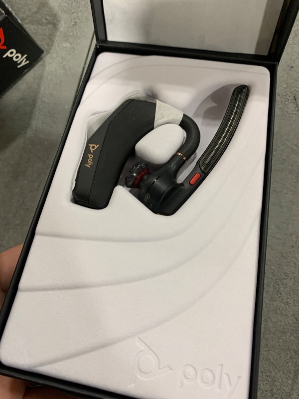 Photo 1 of Poly Voyager Legend 50 - Bluetooth Headset - Wireless Headset with Mic - Four Noise-Canceling Mics, AI Noise Block & WindSmart Technology - Connectivity & Smart Call Controls - All-Day Comfort