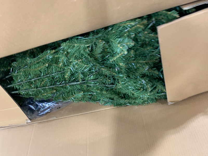 Photo 1 of National Tree Company 7.5 ft Pre-Lit Dunhill Fir Artificial Christmas Tree, 700 LED Lights, 2,514 Tips, Foot Pedal, 10 Light Functions, Includes Stand, Green