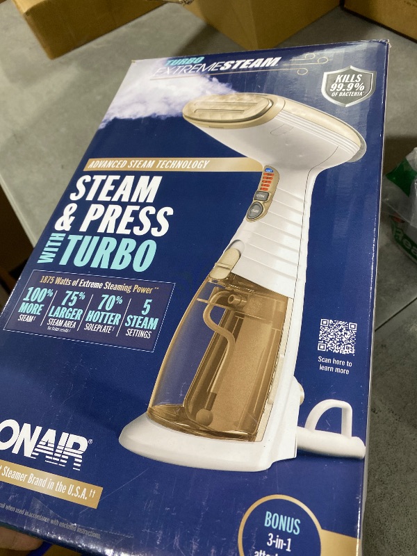 Photo 1 of Conair Handheld Garment Steamer for Clothes, Turbo ExtremeSteam 1875W Fabric Steamer, Portable Handheld Design, Strong Penetrating Steam, White/Champagne