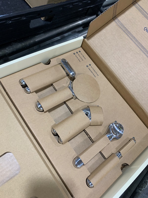 Photo 1 of Caraway Kitchen Gadget Set - 5 Piece Kitchen Essentials - Stainless Steel - Includes Can Opener, Pizza Cutter, Garlic Press, Ice Cream Scoop, Vegetable Peeler, and Storage Organizer