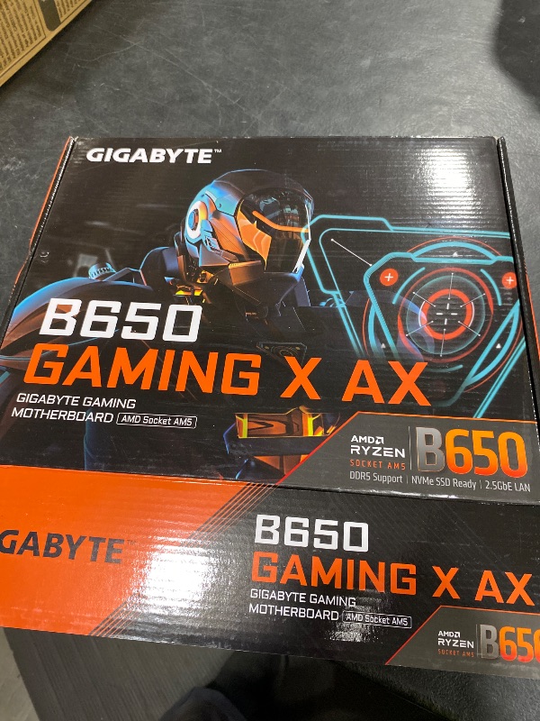 Photo 1 of GIGABYTE B650 Gaming X AX AMD AM5 ATX Motherboard, Support Ryzen 9000/8000/7000, DDR5, 8+2+1 Power Phase, 3X M.2, PCIe 4.0, USB-C 3.2 Gen 2, WIFI6E, 2.5GbE, EZ-Latch, Q-Flash, RGB Fusion