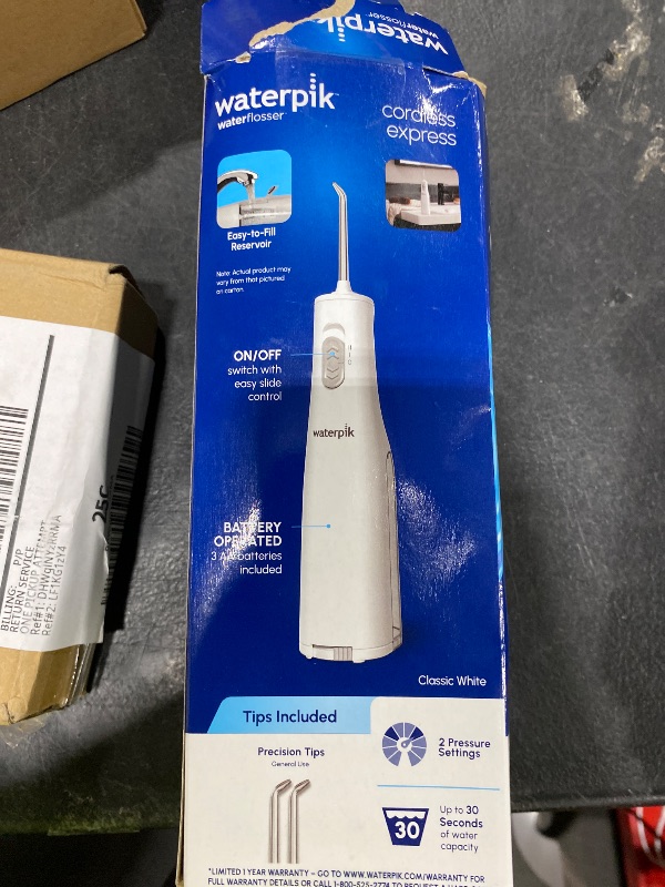Photo 1 of Waterpik Cordless Express Water Flosser, Battery Operated & Portable for Travel & Home, ADA Accepted, Waterproof for Shower Use, White WF-02, Packaging May Vary