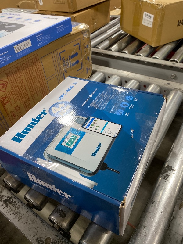 Photo 1 of Hunter Hydrawise HPC400 Smart WiFi Irrigation Controller for Lawns and Gardens, 4 Zone, Expandable to 32 Zones, Weather Based, App Controlled Sprinkler System