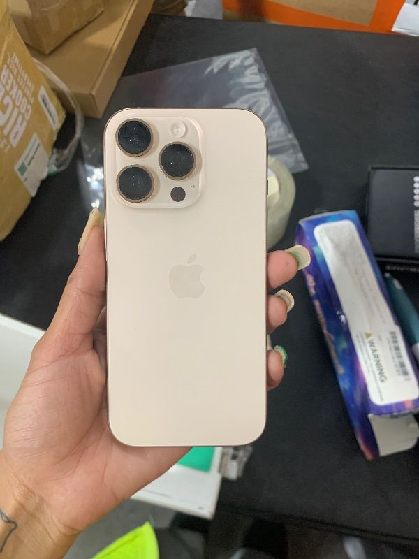 Photo 1 of LOCKED…----------------------------------------------------------….Apple iPhone 16 Pro, US Version, 1TB, Desert Titanium - Unlocked (Renewed Premium)