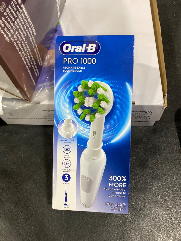 Photo 1 of Oral-B Pro 1000 Rechargeable Electric Toothbrush, White