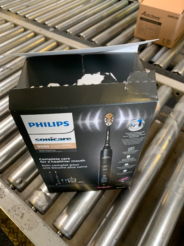 Photo 1 of Philips Sonicare DiamondClean Smart 9500 Electric Toothbrush - Sonic Toothbrush with App, Pressure Sensor, 15 Brushing Settings, Replacement Reminder, USB Charging Travel Case, Black, Model HX9923/11