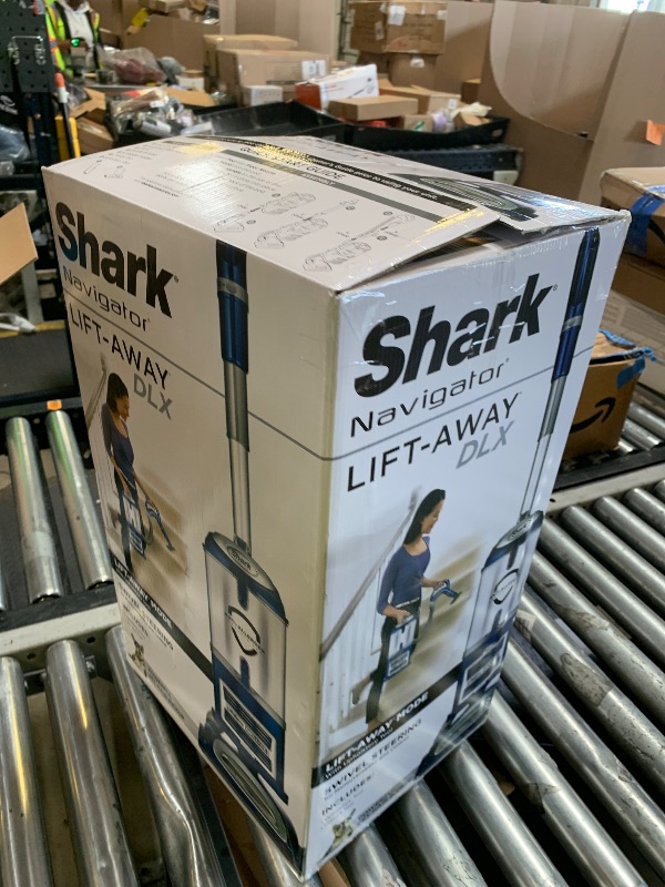 Photo 1 of Shark Upright Vacuum, Navigator Lift-Away Deluxe with Large Dust Cup Capacity, HEPA Filter, Swivel Steering, Upholstery Tool & Crevice Tool, Blue, NV360