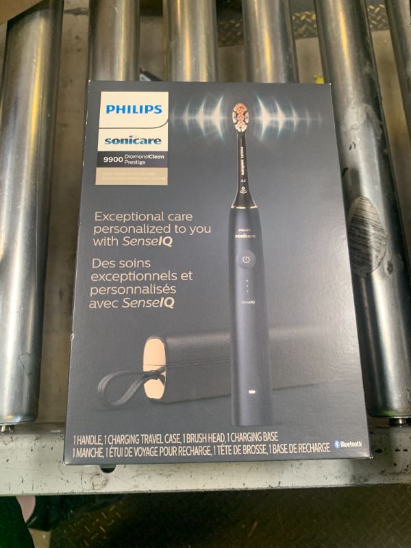 Photo 1 of Philips Sonicare DiamondClean 9900 Prestige Electric Toothbrush - with SenseIQ Technology and Advanced AI App, 5 Brushing Modes, 3 Intensity Levels, Charging Travel Case,Midnight Blue, Model HX9990/12