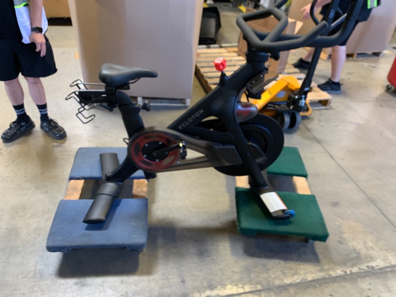 Photo 1 of Peloton Exercise Cross Training Bikes, Indoor Stationary Spin Bikes for Home Workouts, Space-Friendly Exercise Equipment for Cardio and strength Workout & Indoor Cycling