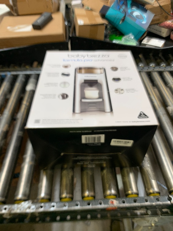 Photo 1 of Baby Brezza New and Improved Formula Pro Advanced Formula Dispenser Machine - Automatically Mix a Warm Formula Bottle Instantly - Easily Make Bottle with Automatic Powder Blending, White