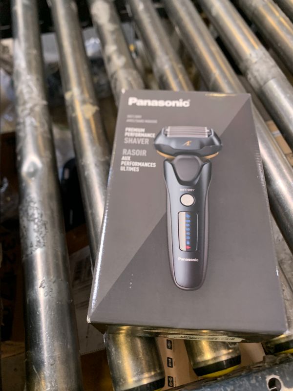 Photo 1 of Used and missing accessories.------------------------------Panasonic Arc5 Electric Razor for Men with Pop-Up Trimmer, Wet/Dry 5-Blade Shaver, Mens Electric Razors for Shaving Face with Intelligent Shave Sensor and 16D Pivoting Head, ES-LV67-K (Black)