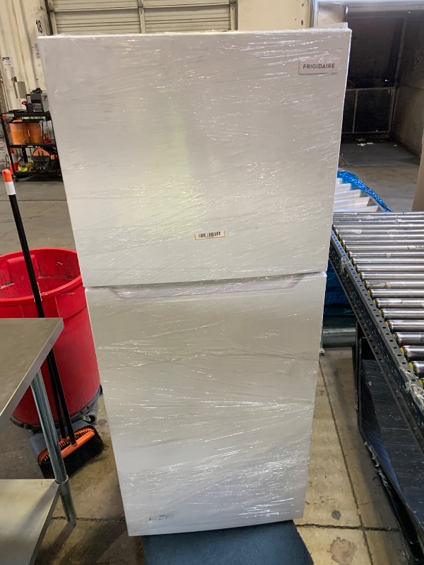 Photo 1 of Frigidaire, 2 Door Apartment Size Refrigerator with Freezer, 7.5 cu ft, Adjustable Spill-Proof Shelves, Crisper Bins, Platinum Silver, Garage Ready