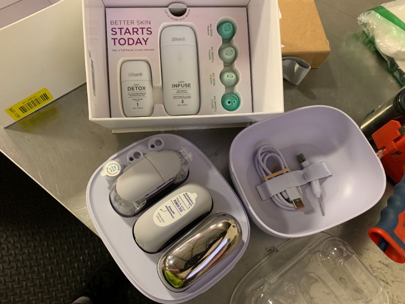 Photo 1 of Shark FacialPro Glow at-Home Hydro-Powered Facial System with DePuffi Hot & Cold Therapy – Professional Spa Skincare Device for Pore Cleansing, Hydration, & Radiant Glow, Lilac, FH320PL