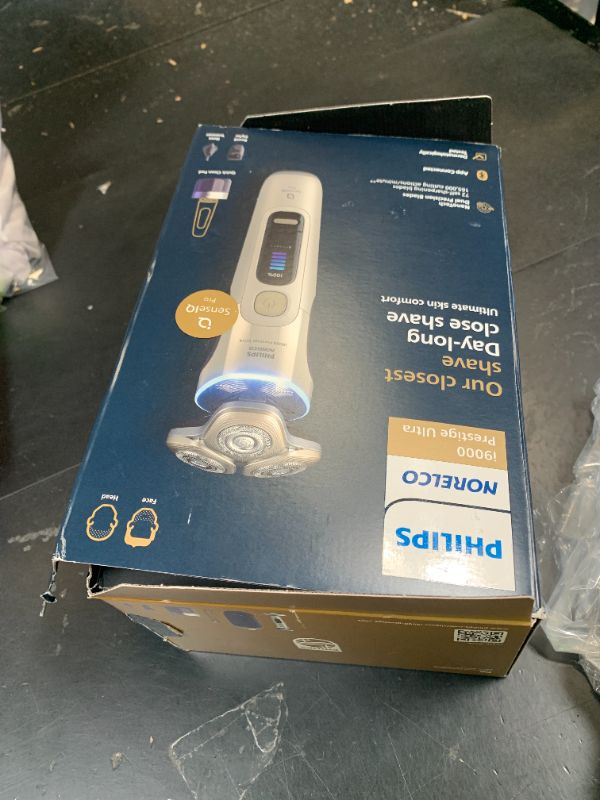 View 2 of Philips Norelco Shaver i9000 Prestige Ultra, Wet & Dry Electric Shaver, White Gold, SenseIQ Pro Technology, Triple Lift & Cut System, 360 Rotating NanoTech Precision Blades, Beard Styler, XP9403/88