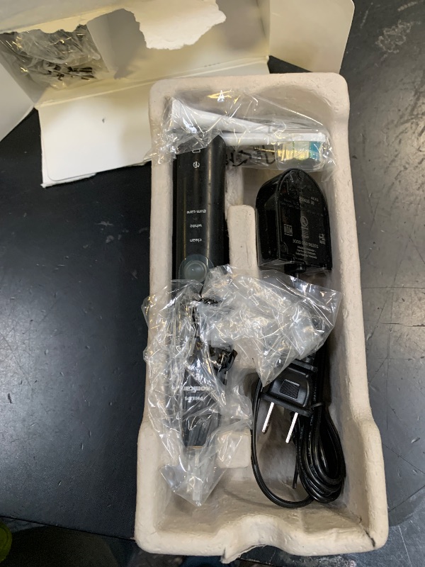 Photo 1 of Philips Sonicare ProtectiveClean 5300 Rechargeable Electric Toothbrush, with Pressure Sensor, 3 Cleaning Modes, SmarTimer and QuadPacer, with 2 Bonus Brush Heads, Travel Case, Black, Model HX6423/34