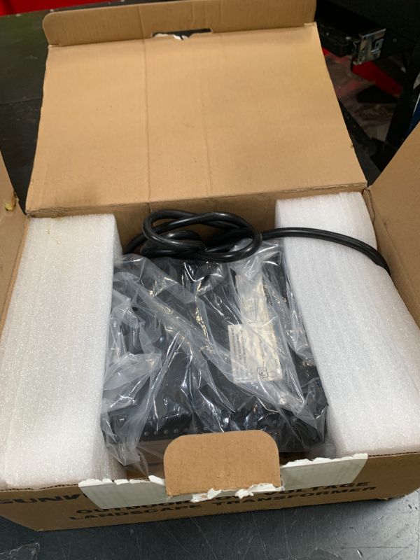 Photo 1 of SUNVIE 200W Low Voltage Landscape Transformer with 2 Independent Control Output Landscape Lighting Transformer with Timer and Photocell Sensor 120V AC to 12/14V AC Weatherproof Low Voltage Transformer