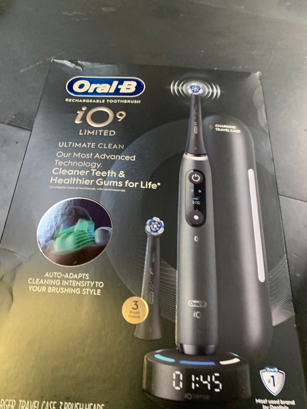 Photo 1 of Oral-B Rechargeable Electric Toothbrush, iO9 Limited Ultimate Clean, 7 Cleaning Modes, Interactive Display, iSense Charger, Charging Travel Case, Visible Pressure Sensor, 3 Brush Heads, Black