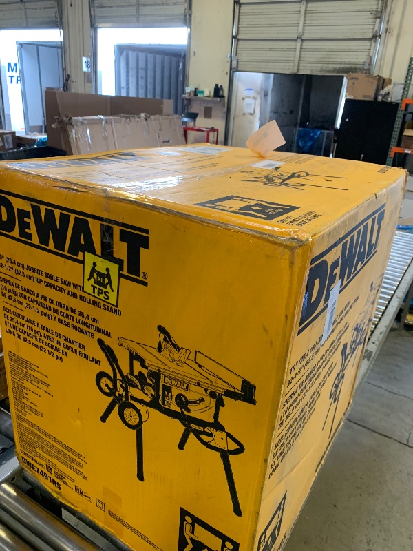 Photo 1 of DEWALT Table Saw 10 Inch with Foldable Rolling Table Saw Stand, 15 Amp, 4800 RPM, 32-1/2-Inch Rip Capacity (DWE7491RS)