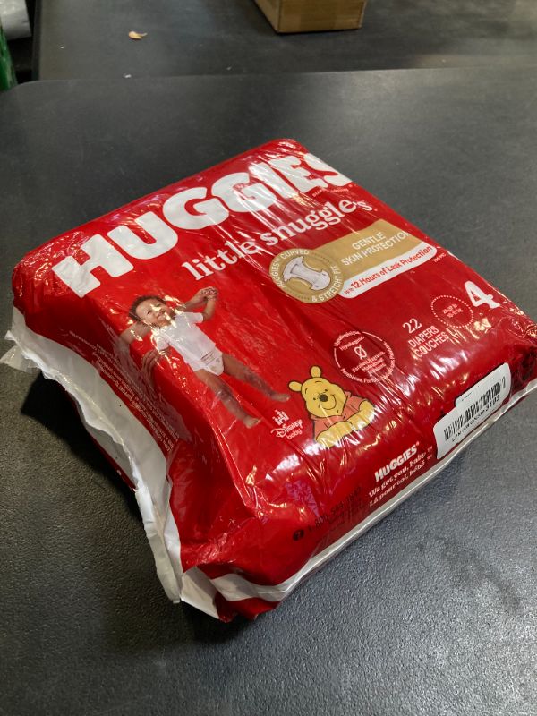 Photo 1 of Huggies Size 4 Diapers, Little Snugglers Baby Diapers, Size 4 (22-37 lbs), 22 Count, Packaging May Vary