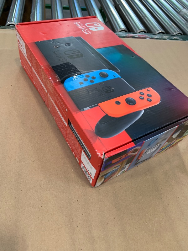 Photo 1 of Nintendo Switch with Neon Blue and Neon Red Joy?Con