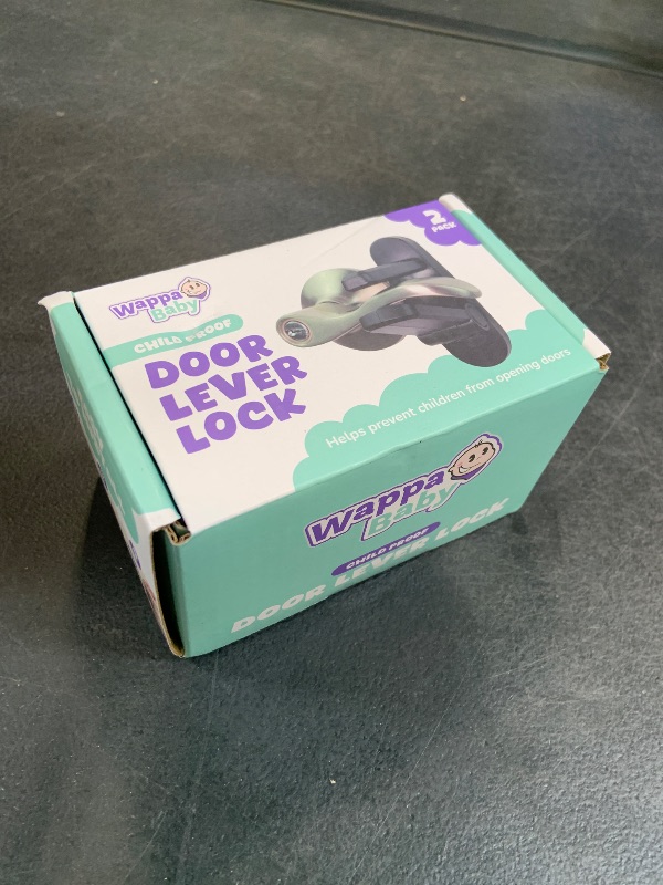 View 2 of Door Lever Lock (2 Pack) Prevents Toddlers from Opening Doors. 3.25" L * 1.5" W * 4.5" H Easy One Hand Operation for Adults. Durable ABS with 3M Adhesive Backing. Simple Install, Black