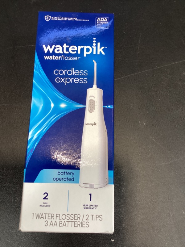 Photo 1 of Waterpik Cordless Express Water Flosser, Battery Operated & Portable for Travel & Home, ADA Accepted, Waterproof for Shower Use, White WF-02, Packaging May Vary