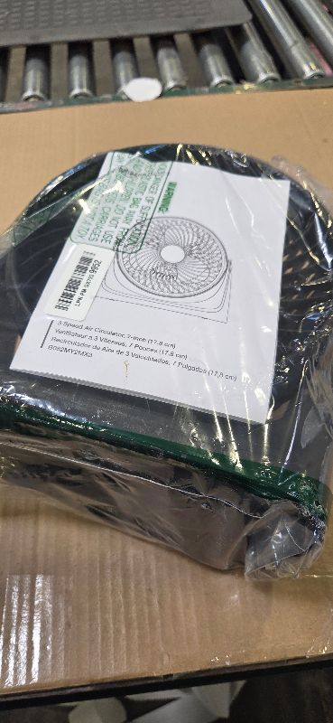 Photo 1 of Amazon Basics Air Circulator Desk Fan for Bedroom, Home and Office, 90-Degree Tilt Head, 3 Speed Settings, Cooling, 35 Watts, Black, 11.1"W x 6.3"D x 10.9"H