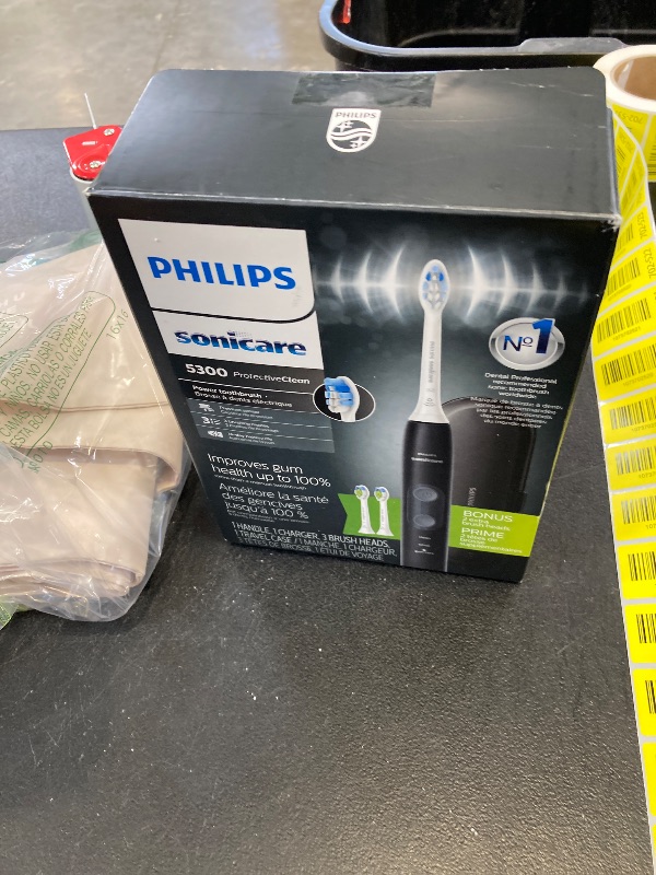 Photo 1 of Philips Sonicare ProtectiveClean 5300 Rechargeable Electric Toothbrush, with Pressure Sensor, 3 Cleaning Modes, SmarTimer and QuadPacer, with 2 Bonus Brush Heads, Travel Case, Black, Model HX6423/34