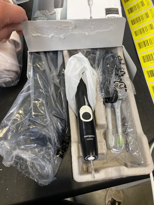 Photo 1 of Philips Sonicare ProtectiveClean 5300 Rechargeable Electric Toothbrush, with Pressure Sensor, 3 Cleaning Modes, SmarTimer and QuadPacer, with 2 Bonus Brush Heads, Travel Case, Black, Model HX6423/34