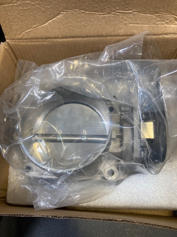 Photo 1 of Dorman 977-827 Electronic Throttle Body Compatible with Select Ford Models (OE FIX)