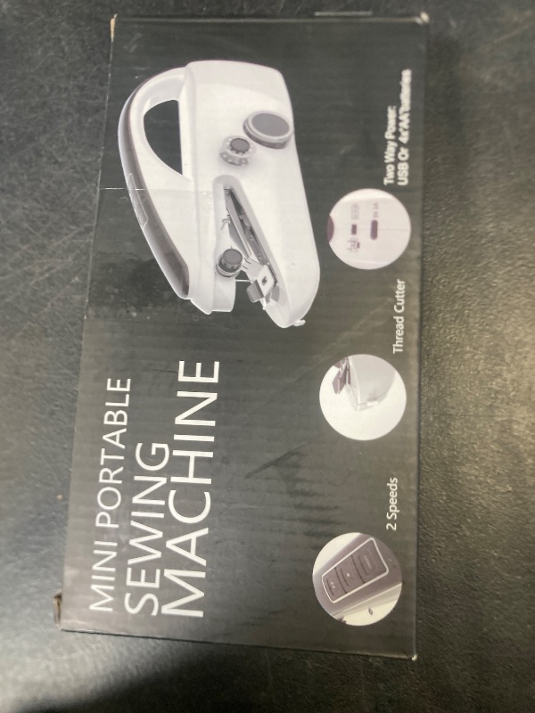 Photo 1 of Handheld Sewing Machine337