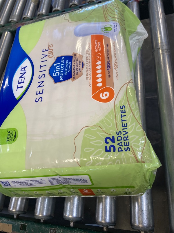 Photo 1 of tena sensitive care pads 52 ct